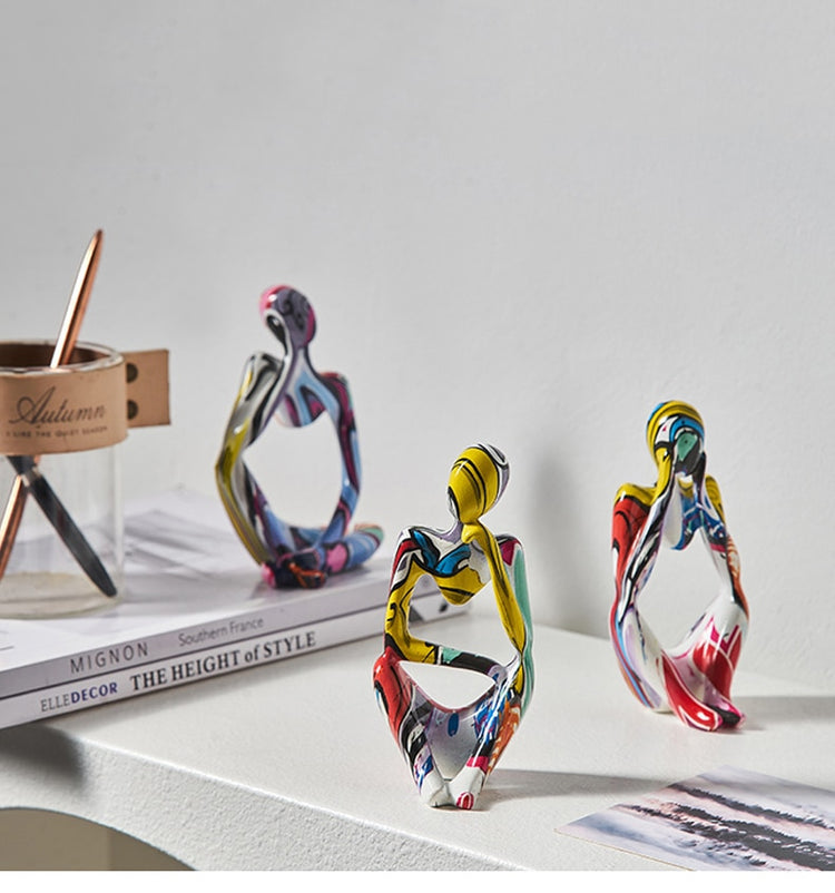 Bright Colorful Thinker Figurines for Creative Spaces
