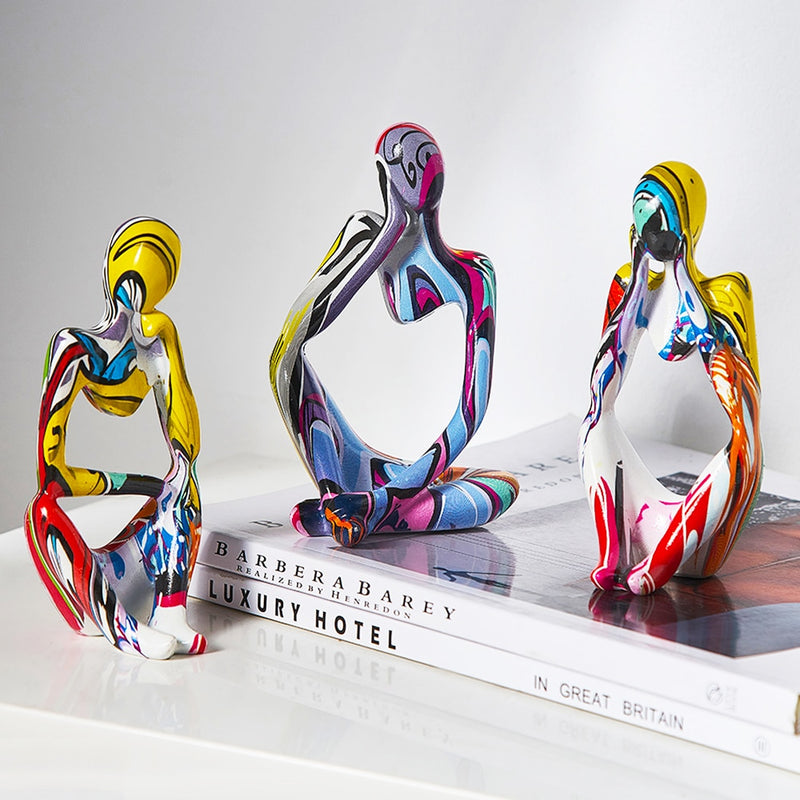 Bright Colorful Thinker Figurines for Creative Spaces