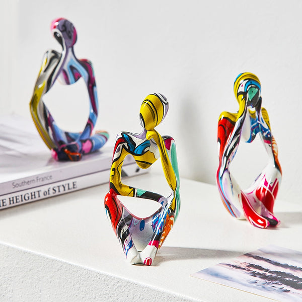 Bright Colorful Thinker Figurines for Creative Spaces